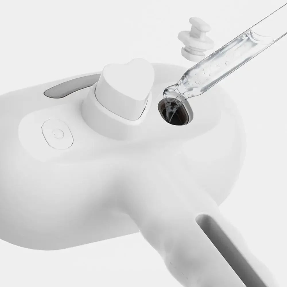 Brosse spray vapeur pour chat - Humidifie et démêle
